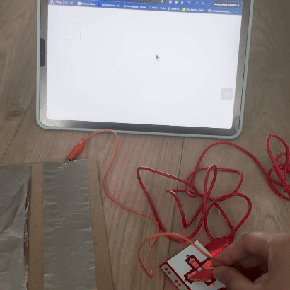 Here I had the ground connected to the foil and then another wire connecting to that foil that I used to press the other keys. 